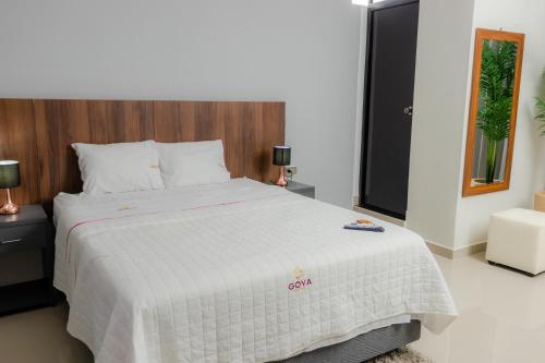 Кровать или кровати в номере GOYA HOTEL
