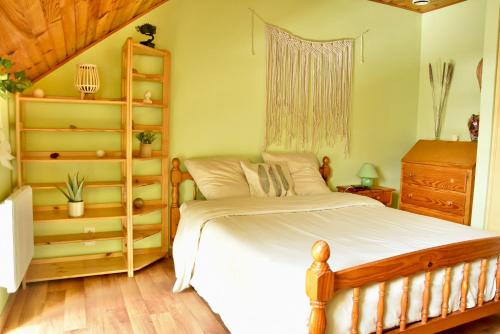 Llit o llits en una habitació de Chambres chez l'habitant - Chez Nico & Belen