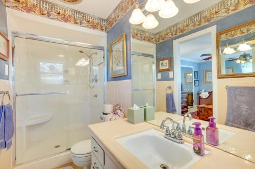 a bathroom with a sink and a shower at Lovely Bryan Home with Deck - 4 Mi to Kyle Field! in Bryan