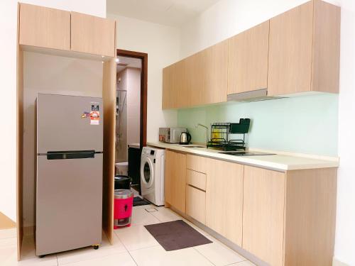 Η κουζίνα ή μικρή κουζίνα στο GYDEN STAYCATION #Green Haven near Senibong&Regency