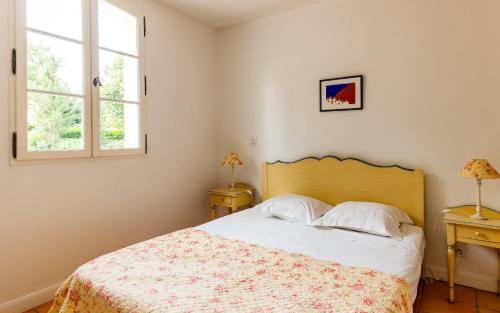 Un ou plusieurs lits dans un hébergement de l'établissement Lagrange Vacances Domaine de Fayence