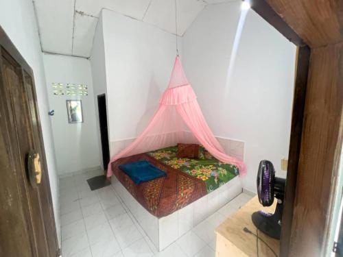 Ένα ή περισσότερα κρεβάτια σε δωμάτιο στο Umiyuki guesthouse and restaurant