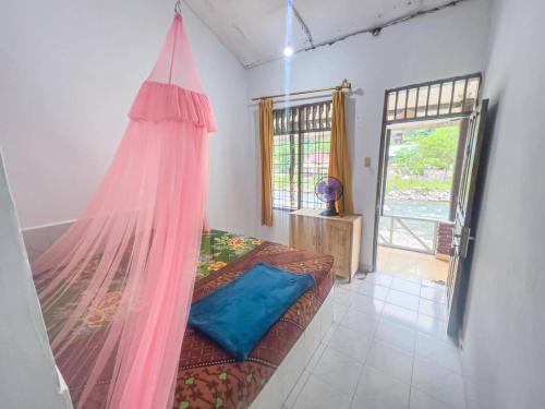 Ένα ή περισσότερα κρεβάτια σε δωμάτιο στο Umiyuki guesthouse and restaurant