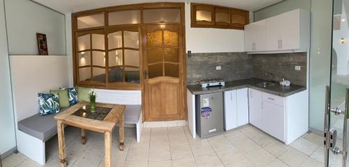 Kjøkken eller kjøkkenkrok på Alojamiento Baños del Inca