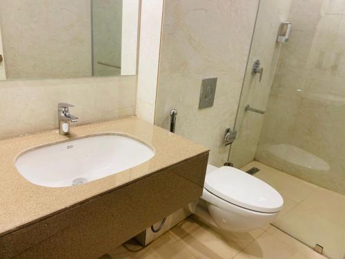 a bathroom with a sink and a toilet at The Shanti A Boutique Hotel in Jodhpur