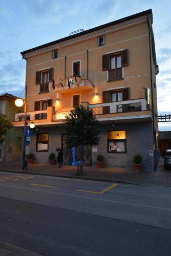 a building on the side of a street at Hotel Rosignano in Rosignano Solvay
