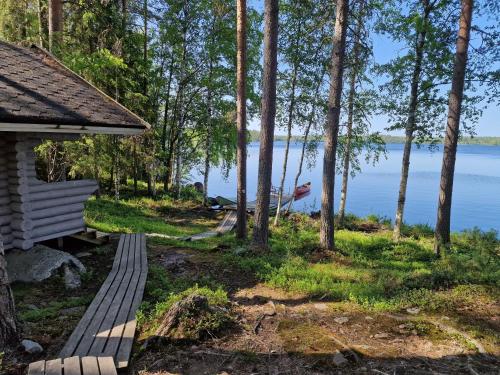 a view of the lake from the porch of a cabin at Vacation Home Tulikallio in Suonenjoki