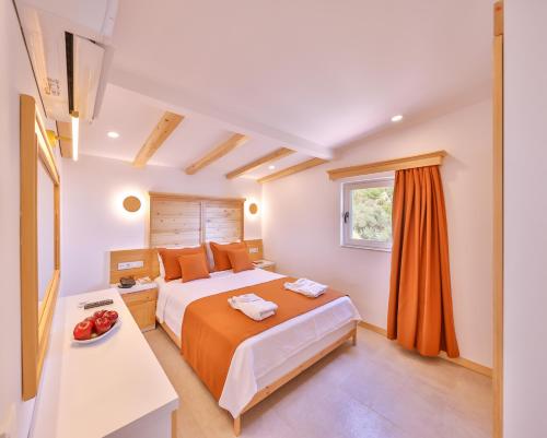 Ένα ή περισσότερα κρεβάτια σε δωμάτιο στο Hotel Aysima