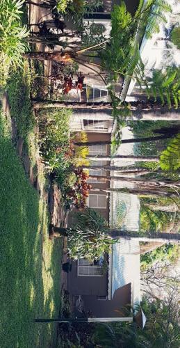 an overhead view of a building with plants on it at Koppie Allen guest house in Pongola