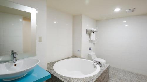 Koupelna v ubytování Walker Hotel - Zhengyi
