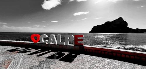 a sign with the word cape on the beach at Villa Inia - PlusHolidays in Calpe