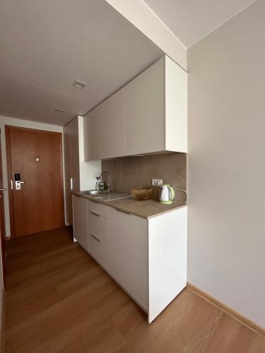 Køkken eller tekøkken på Alkos apartamentai