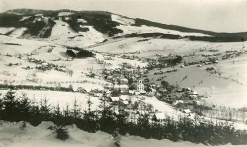 a black and white photo of a village in the snow at Apartmany Dolni Rokytnice nad jizerou čp 37 in Rokytnice nad Jizerou