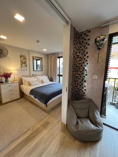Letto o letti in una camera di Marvest Condo Hua Hin