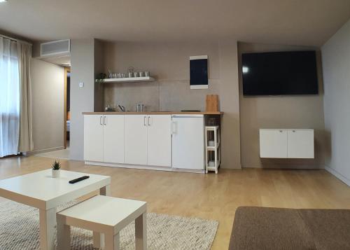 TV a/nebo společenská místnost v ubytování Marida Hotel