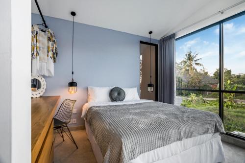 Ένα ή περισσότερα κρεβάτια σε δωμάτιο στο Mr. & Mrs. W Pererenan