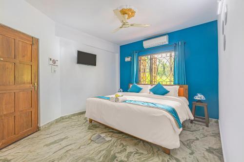 Cama ou camas em um quarto em The Sequeira Goa