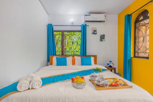 Cama ou camas em um quarto em The Sequeira Goa