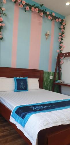 Postel nebo postele na pokoji v ubytování LẠI NGUYỄN BOUTIQUE HOTEL