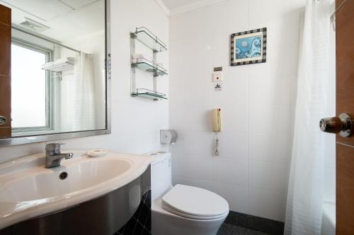 Koupelna v ubytování Yihe Hotel Ouzhuang