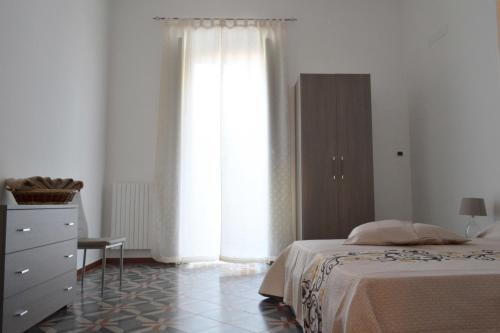Posteľ alebo postele v izbe v ubytovaní B&B Venti del Sud