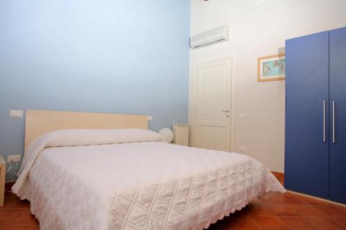 Katil atau katil-katil dalam bilik di Casa Vacanze Vecciano