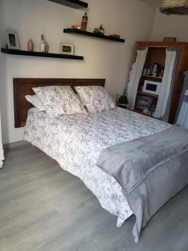 Кровать или кровати в номере Chez Didier et vero