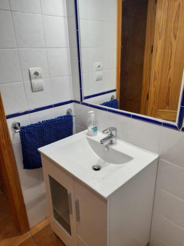 a bathroom with a sink and a mirror at Casa Mercedes in Molinicos