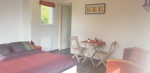 Postel nebo postele na pokoji v ubytování L Hyppo Camp'