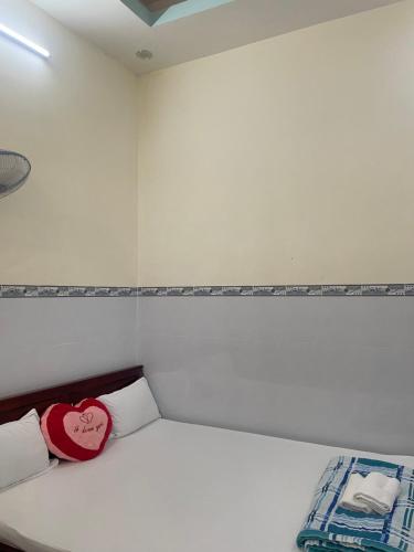 Ένα ή περισσότερα κρεβάτια σε δωμάτιο στο My Linh Motel 976 Đường võ thị sáu long hải