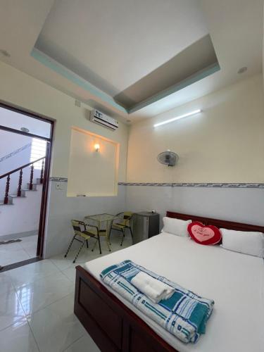 Ένα ή περισσότερα κρεβάτια σε δωμάτιο στο My Linh Motel 976 Đường võ thị sáu long hải