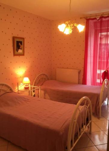 Postel nebo postele na pokoji v ubytování Chambres d'hôtes du Maspourquet
