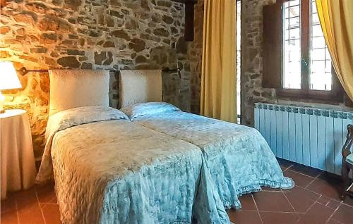 Casa Coldi SassoにあるLa Vallicellaの石造りの壁のドミトリールーム(ベッド1台)