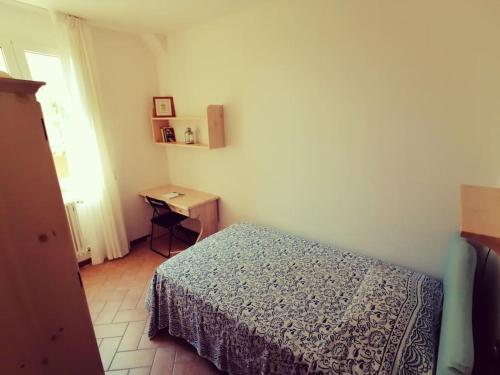Ένα ή περισσότερα κρεβάτια σε δωμάτιο στο Casa l'aria leggera