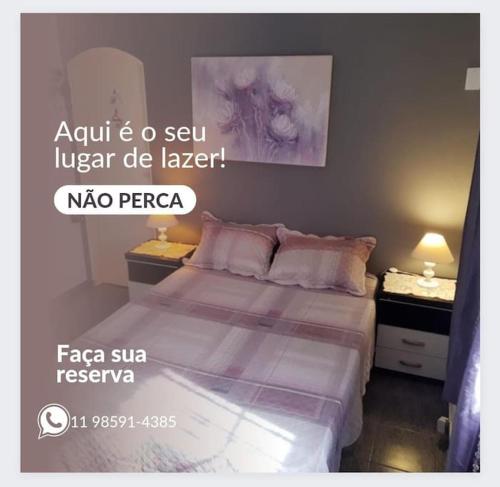En eller flere senge i et værelse på Hostel Mazoca