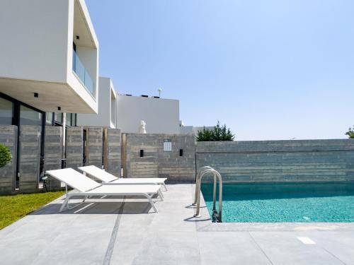 Bazén v ubytování Sunset Park Villas nebo v jeho okolí