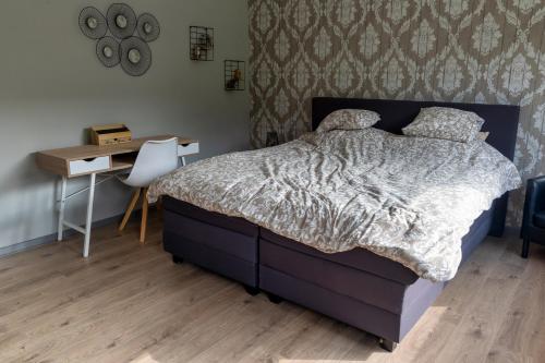 Postel nebo postele na pokoji v ubytování Au Repos de la Redoute