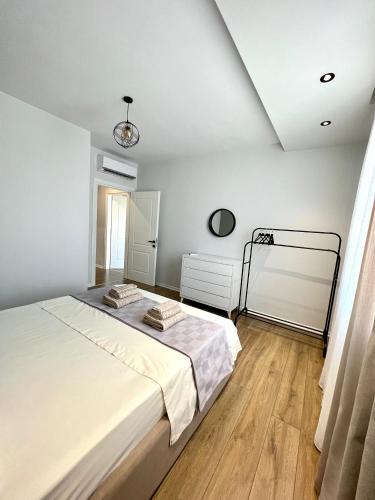 Postel nebo postele na pokoji v ubytování George apartments2023/2