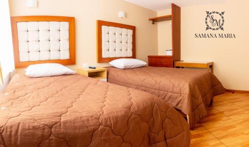 una habitación de hotel con 2 camas en una habitación en SSAMANA MARÍA APARTMENT 202, en Arequipa