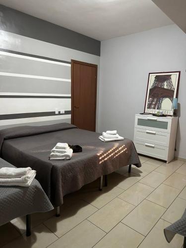 Cama o camas de una habitación en B&B Emmanuel