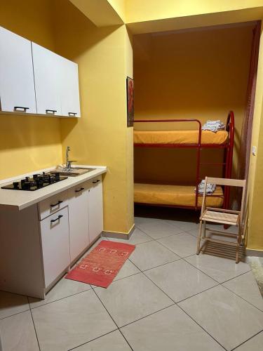 Una cocina o zona de cocina en B&B Emmanuel