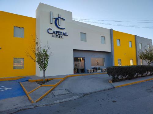 a building with a sign that reads ic central hotel at Capital Hotel in Monclova
