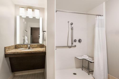 a bathroom with a sink and a shower at TownePlace Suites by Marriott Harrisburg West/Mechanicsburg in Mechanicsburg