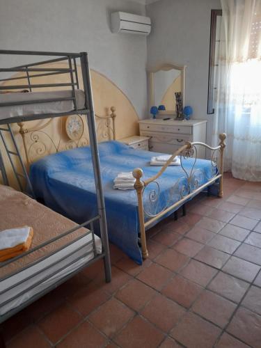 Krevet ili kreveti u jedinici u okviru objekta Villa Ambra Marzamemi
