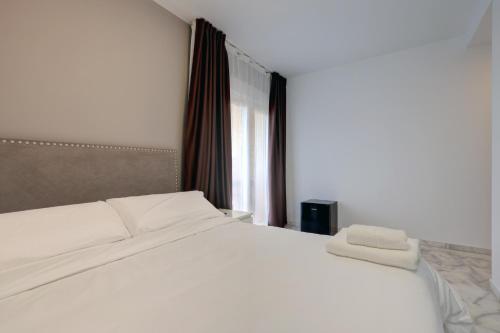 Postel nebo postele na pokoji v ubytování Hostal 37