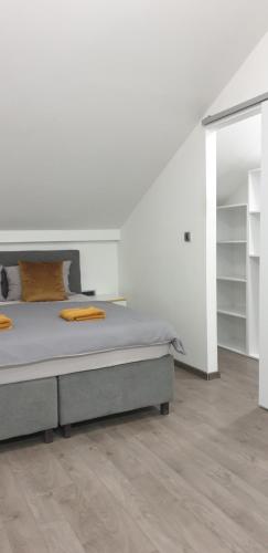 Ένα ή περισσότερα κρεβάτια σε δωμάτιο στο R-RESIDENCY DELUXE Bl