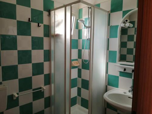 a bathroom with a shower and a sink at Casa Fenice in Marinella di Selinunte