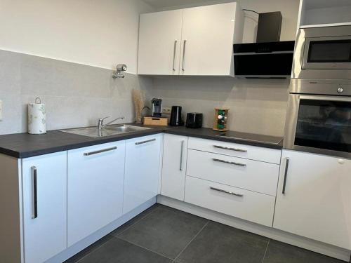 Η κουζίνα ή μικρή κουζίνα στο Apartment Wesseling