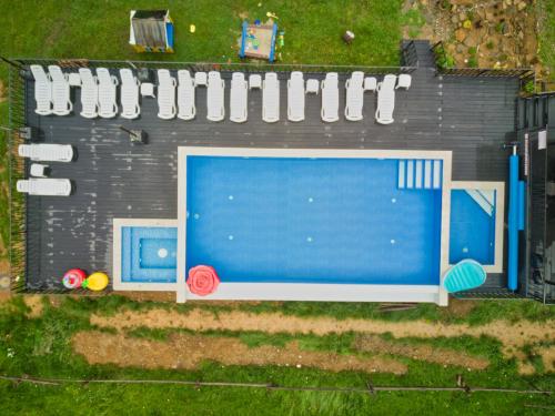 Bazén v ubytování Nicole hotel nebo v jeho okolí