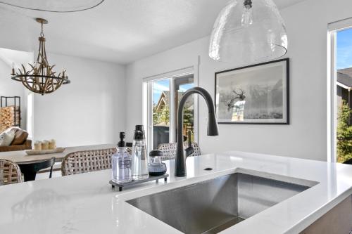 a kitchen with a sink and a counter top at The Willow at McCall in McCall